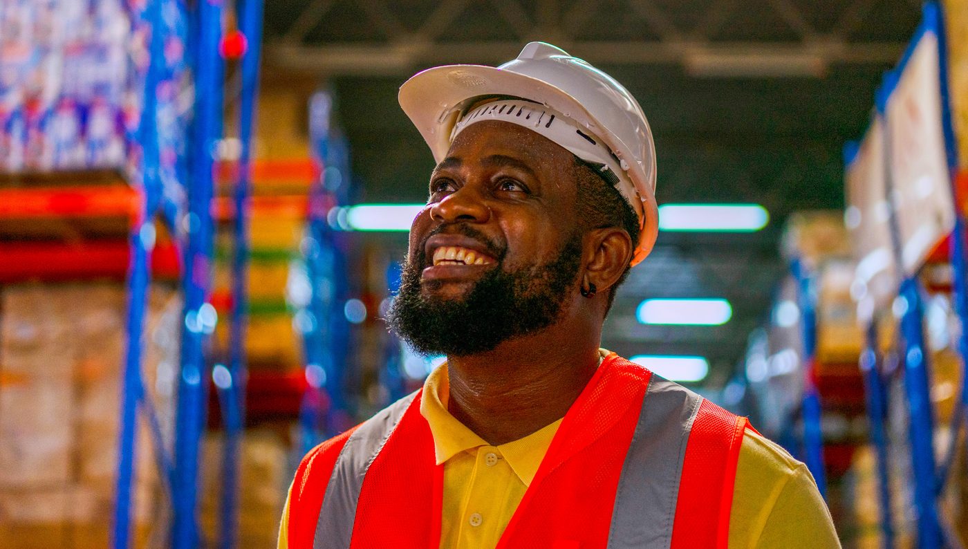 Climatri Foods team member in a distribution warehouse